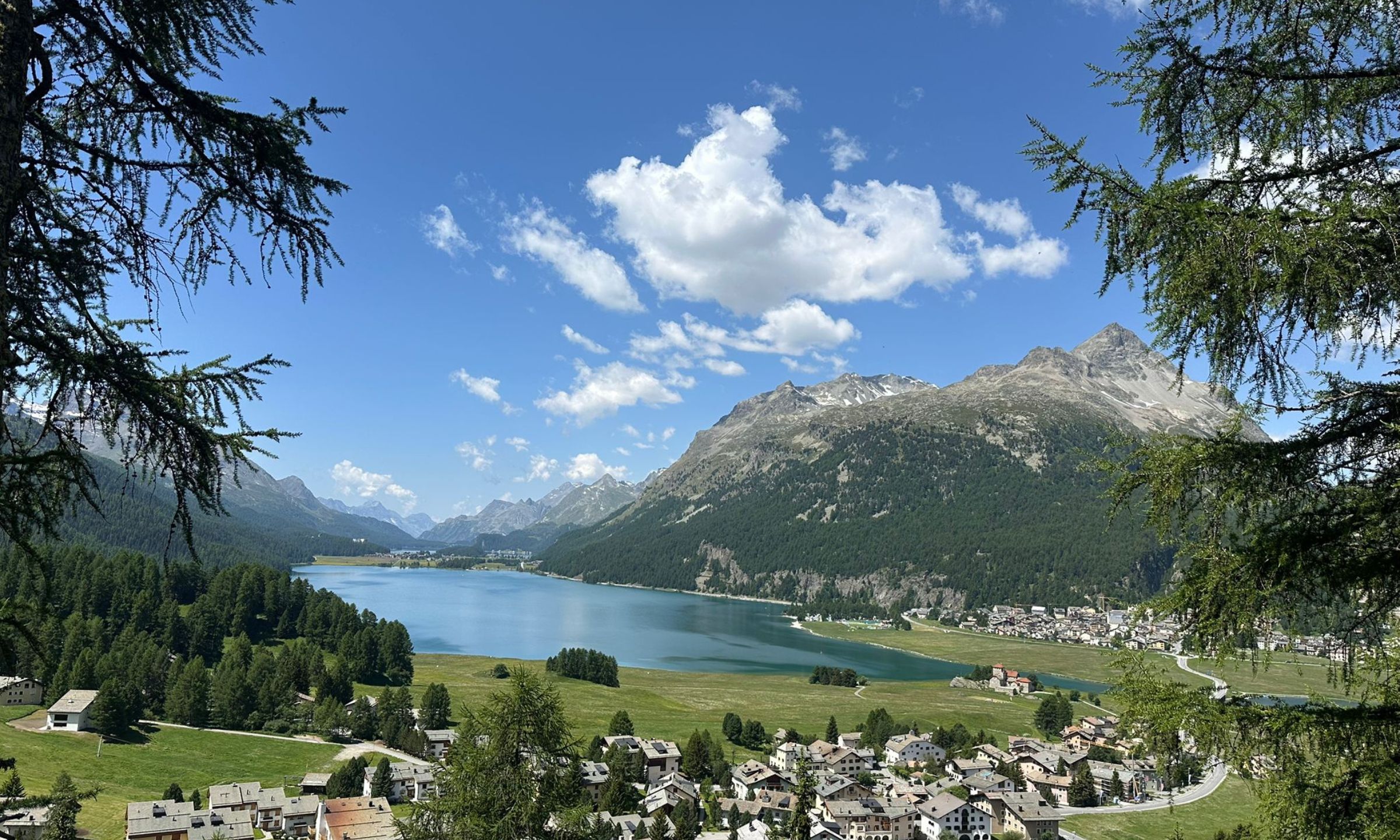 Panoramic view of Lake St. Moritz and the Engadin mountains in Switzerland.